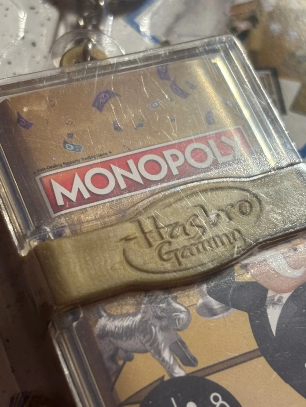Hasbro Monopoly Mini Keychain Game - Gold and Clear. New